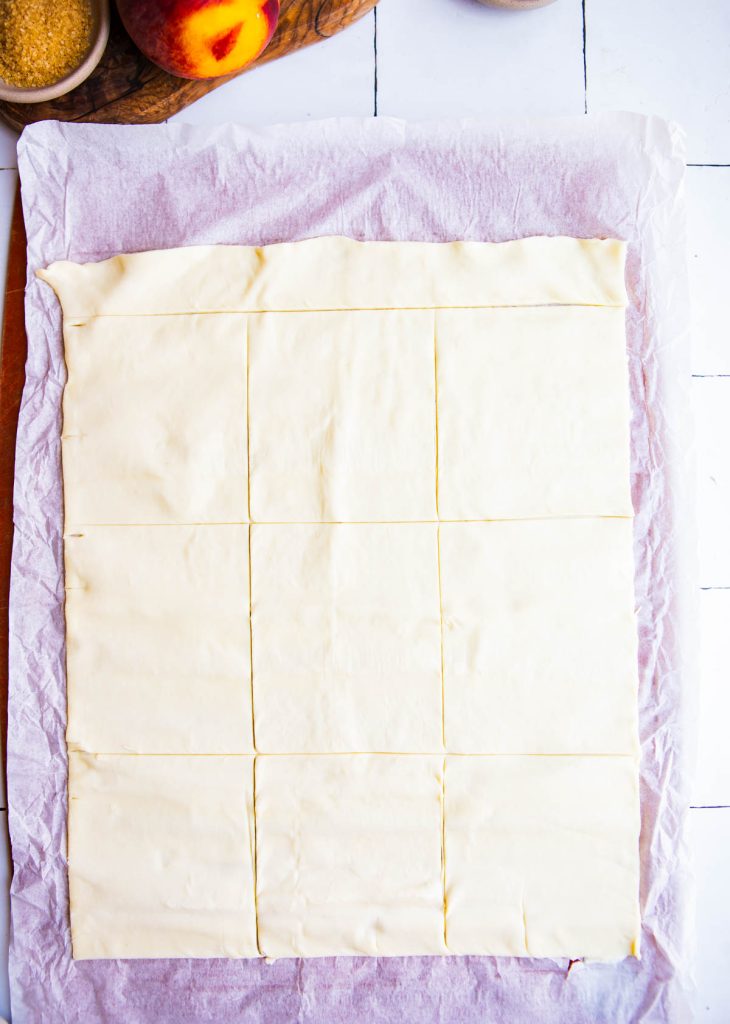 puff pastry sheet cut into 9 even squares