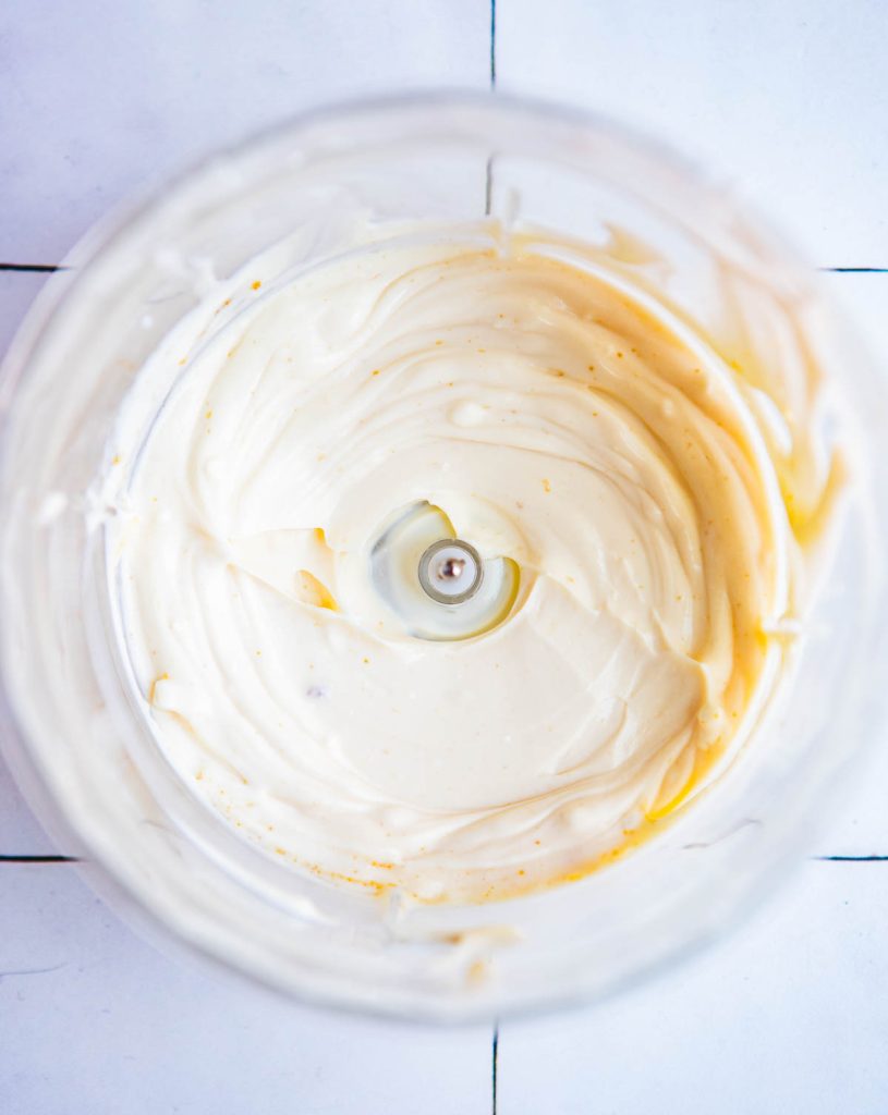 whipped cream cheese and sour cream in a food processor
