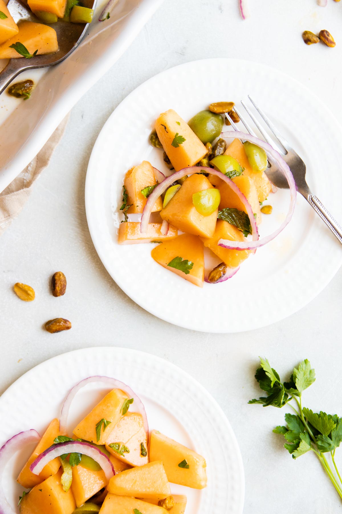 individual salad plates topped with cantaloupe salad