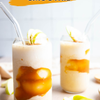 2 glasses filled with a healthy apple smoothie and a glass straw