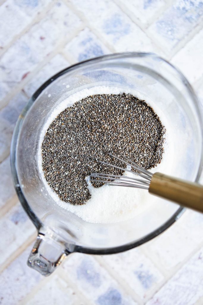 chia seeds added to coconut milk to make chia seed pudding
