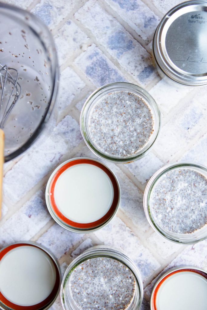 chia seed pudding divided up into mason jars
