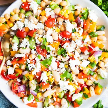cowboy caviar made with chickpeas and topped with feta cheese