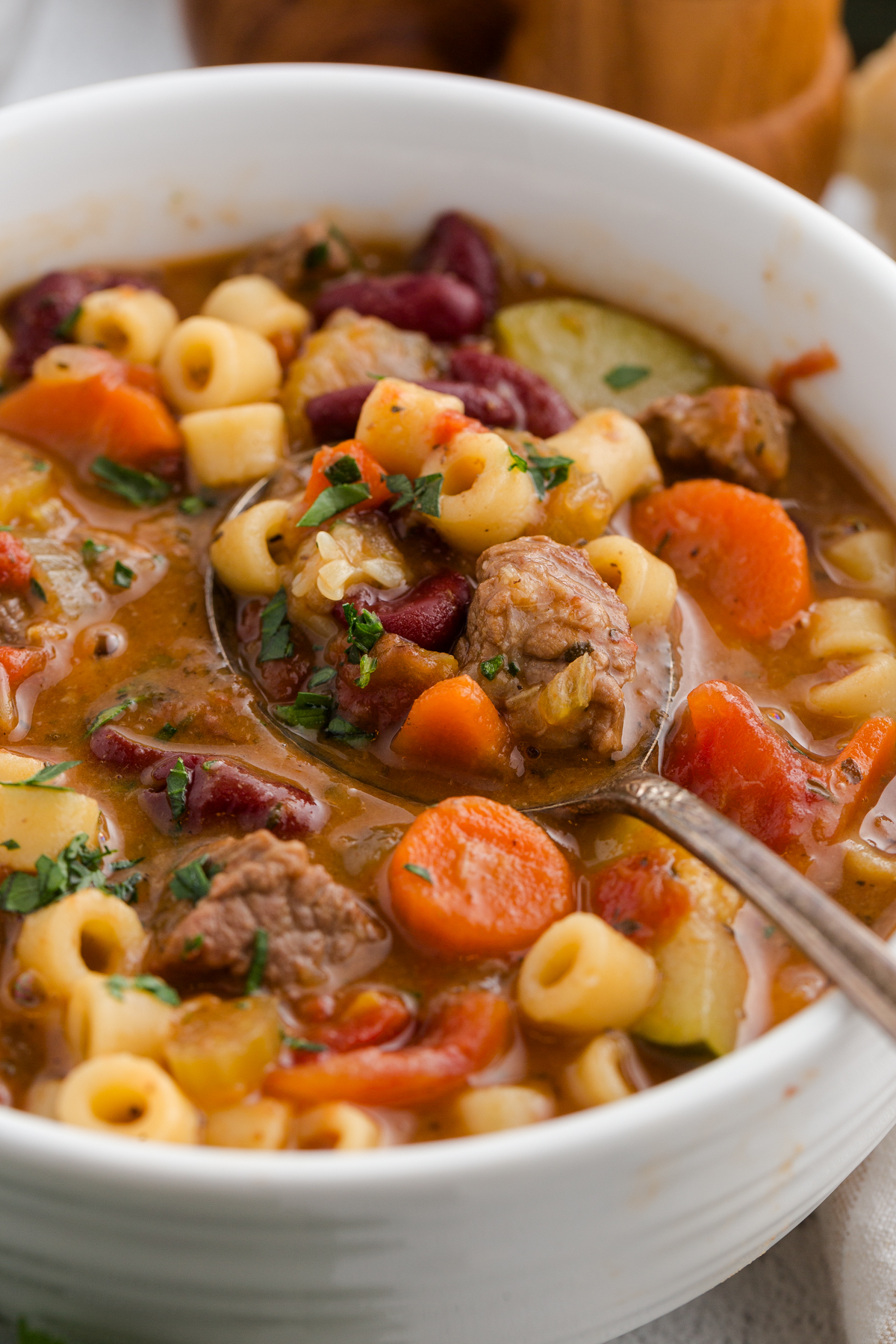 homemade beef minestrone soup in a white bowl