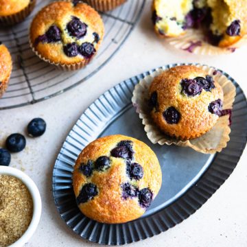 greek yogurt lemon blueberry muffins on a silver metal tin