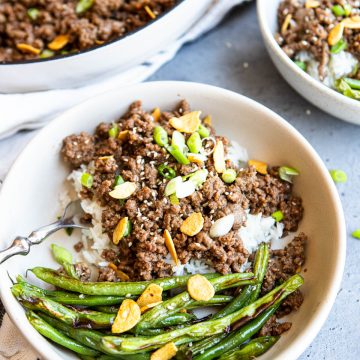 ground beef Asian bowls with steamed rice and blistered green beans