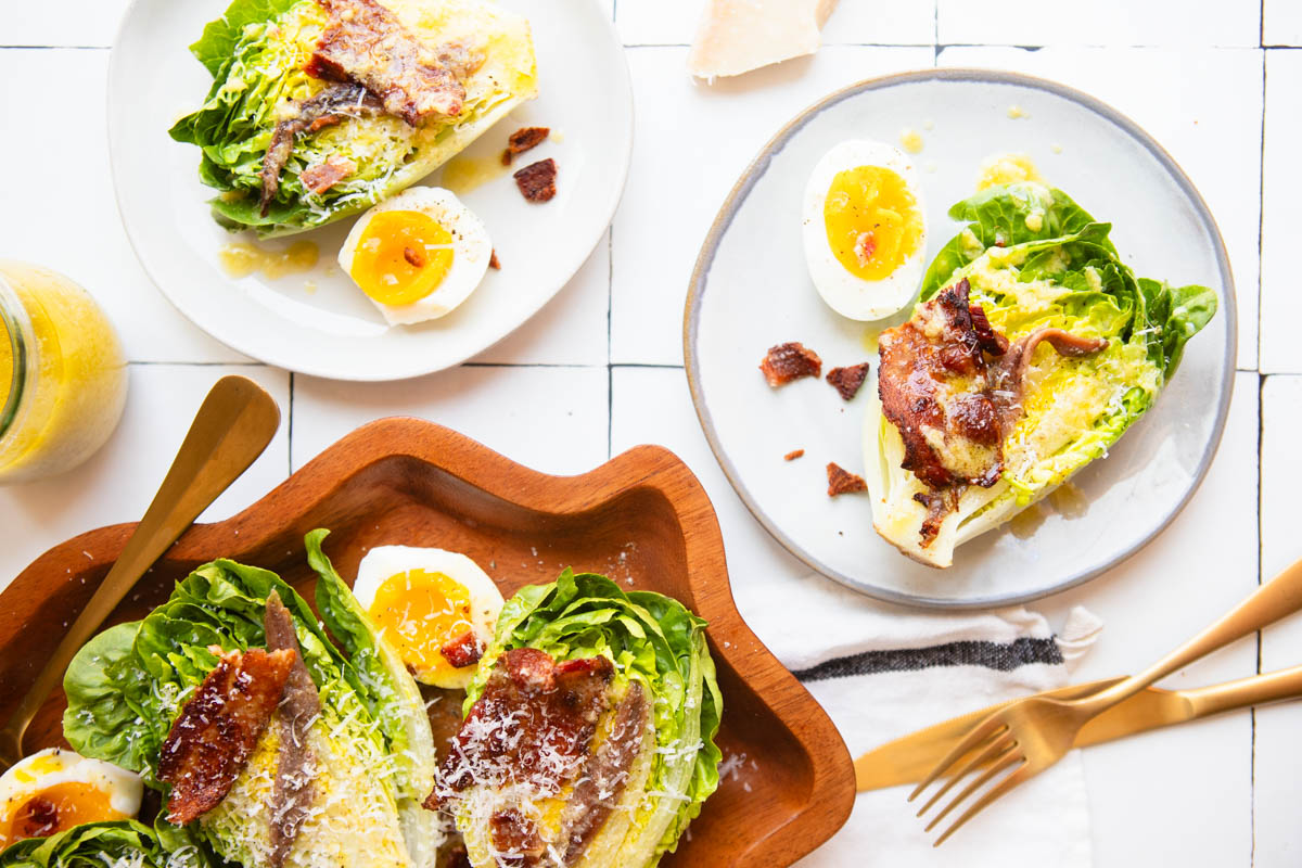 2 small salad plates with little gem salads on top