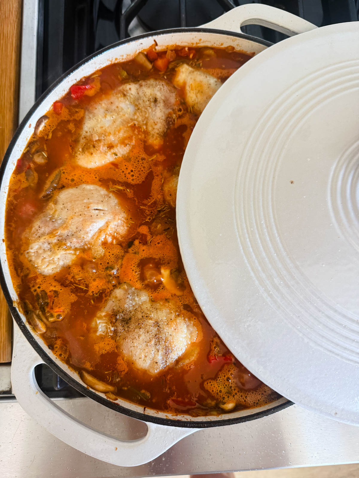 chicken thighs added a blend of veggies and diced tomatoes to make chicken cacciatore 