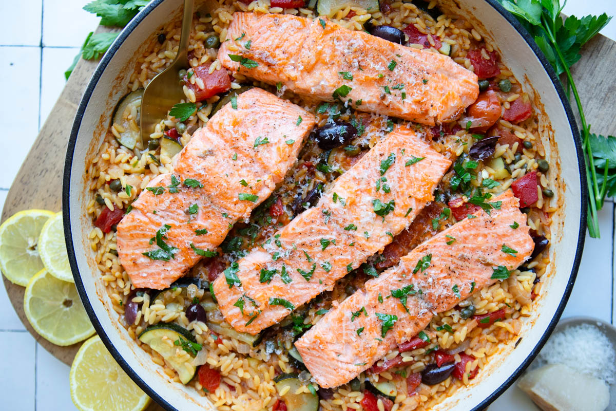 one pan Mediterranean salmon dinner with orzo and roasted red peppers