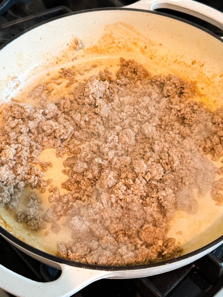 cooked ground turkey in a large enameled cast iron skillet