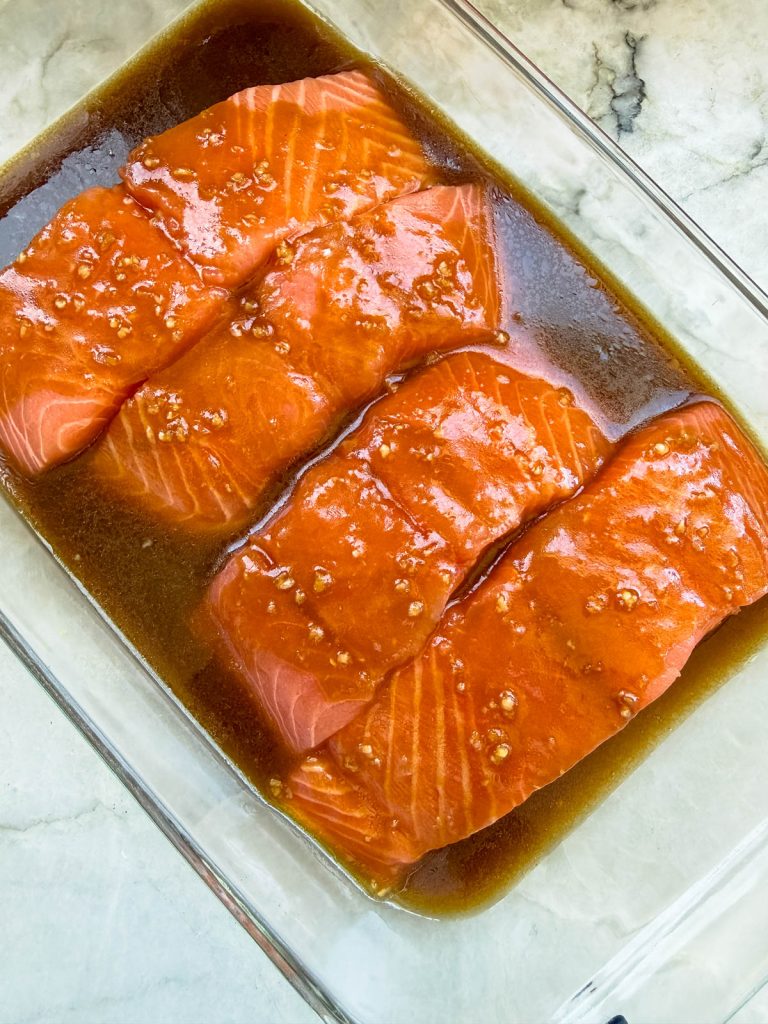 salmon filets marinating in a soy honey miso glaze