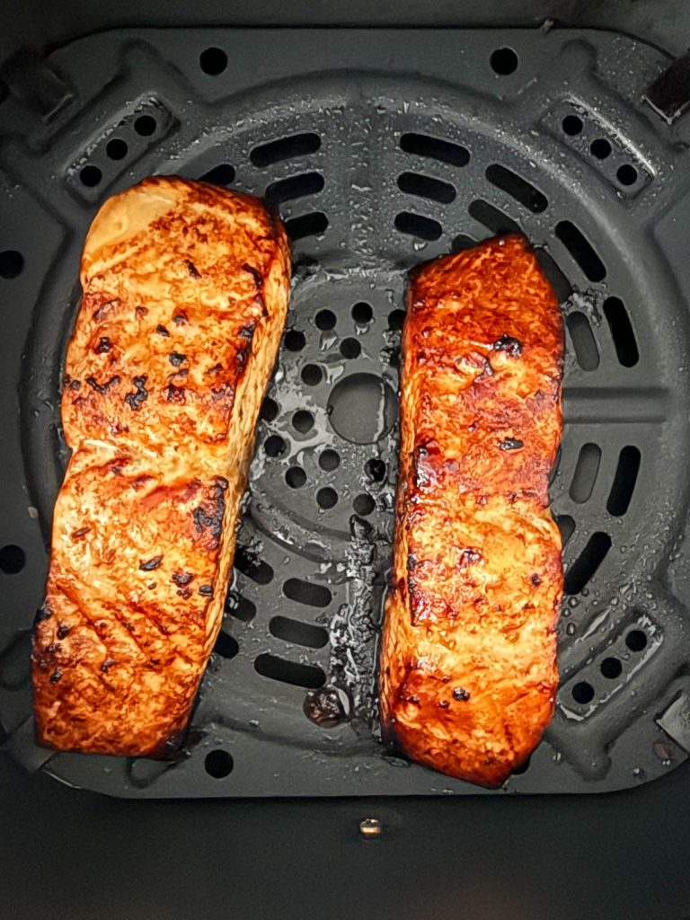 air fried miso glazed salmon pieces in the air fryer basket