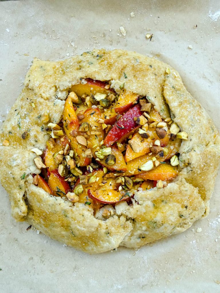 egg brushed on edges of pastry crust and sprinkled with raw sugar
