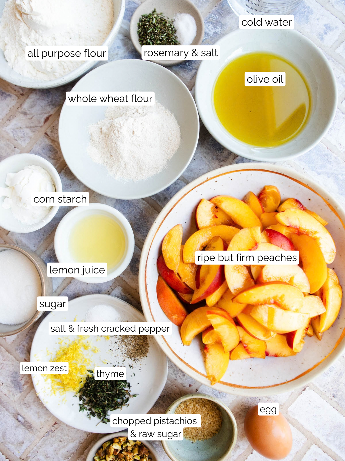 ingredients to make a peach galette with pistachio crumble