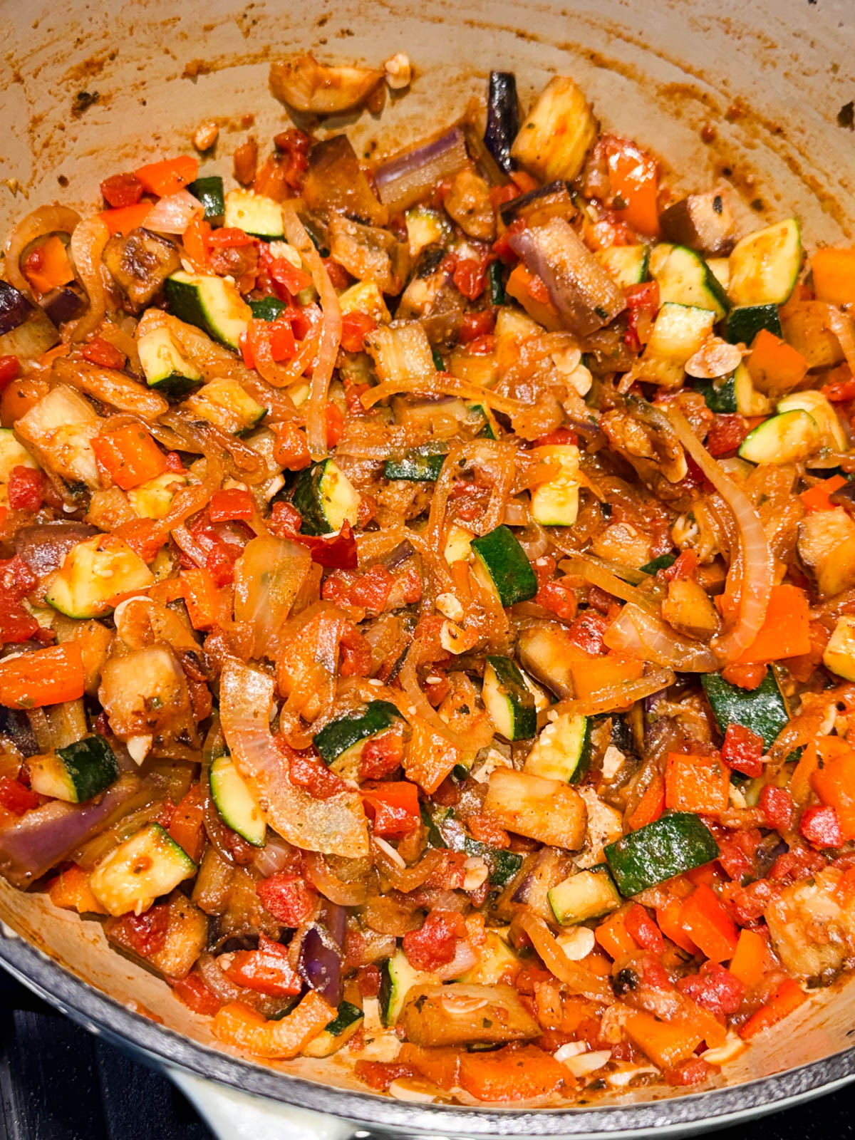 easy ratatouille cooking on the stovetop in a heavy bottom large Dutch oven